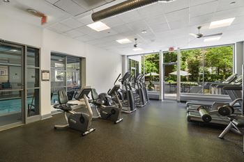 24 hour gym with treadmills, exercise bikes and other equipment at Lenox Part in National Landing, Arlington VA 22202